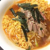 Korean Ramen · Wheat noodle in spicy soup with beef flanks, nori, and sesame. Spicy.
