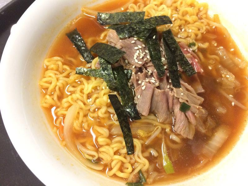 Korean Ramen · Wheat noodle in spicy soup with beef flanks, nori, and sesame. Spicy.