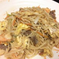Cantonese Chow Fun · Stir-fried wide rice noodles with comb meats.
