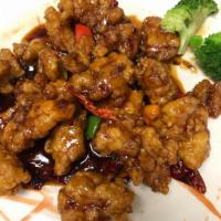 General Tso's Chicken · Tenderly breaded fried white meat stir-fried with diced bell peppers in sweet and spicy sauce.