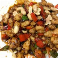 ​Kung Pao Chicken · Diced chicken cooked with bell peppers, chili peppers, peanuts then stir fried in chili kung...