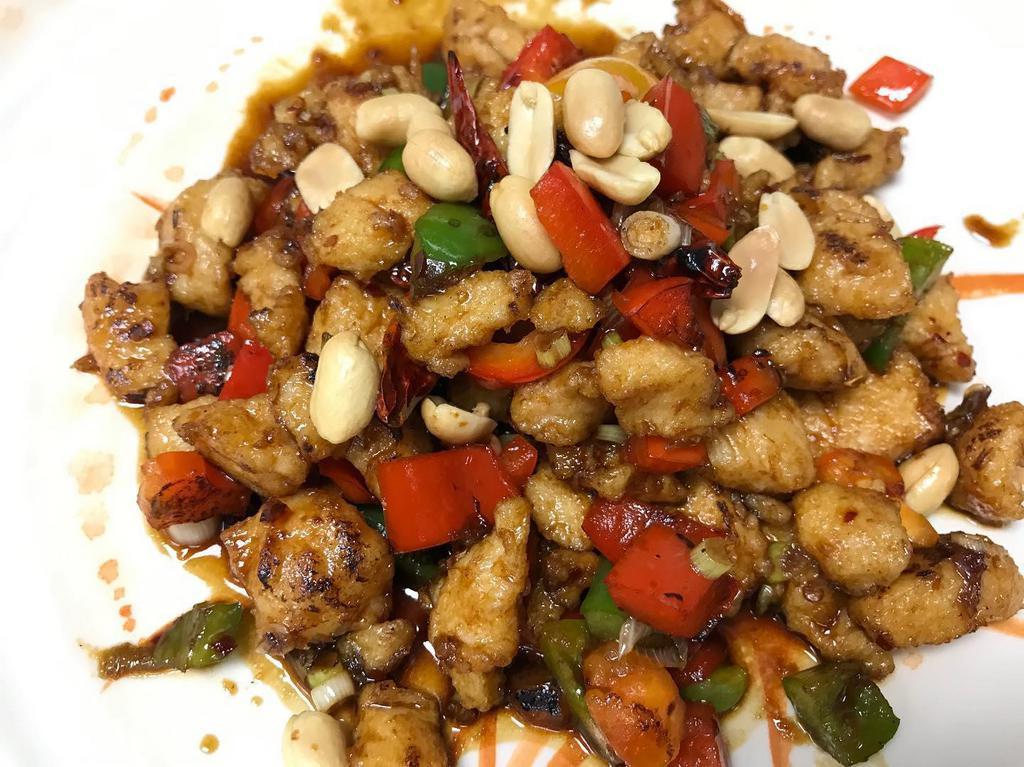 ​Kung Pao Chicken · Diced chicken cooked with bell peppers, chili peppers, peanuts then stir fried in chili kung pao spice.