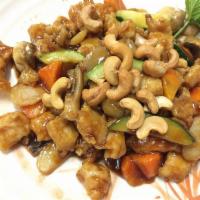 Chicken with Cashew Nuts · Diced chicken stir-fried with carrots, mushroom, zucchini and roasted cashews in our house s...