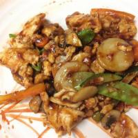 Chicken in Garlic Sauce · Sliced white meat chicken stir-fried with zucchini, carrots, bell peppers, snow peas and mus...
