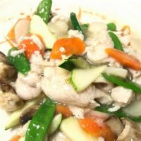Moo Goo Gai Pan · Sliced white meat chicken stir-fried in house white sauce with carrots, zucchini, broccoli, ...