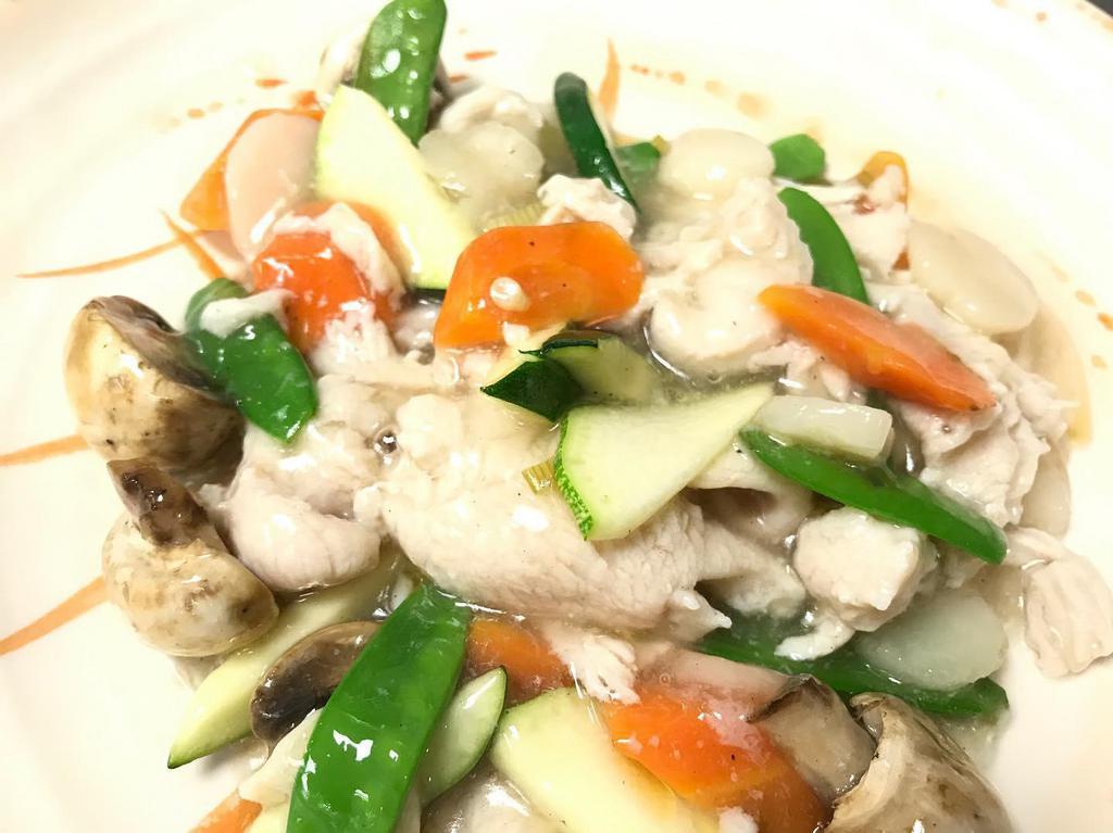 Moo Goo Gai Pan · Sliced white meat chicken stir-fried in house white sauce with carrots, zucchini, broccoli, snow peas and mushrooms.