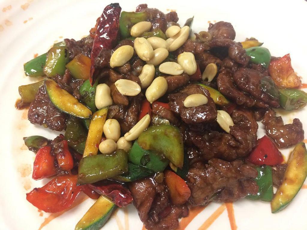 Kung Pao Beef · Cooked with bell peppers, chili peppers, peanuts then stir-fried in chili kung pao spice.