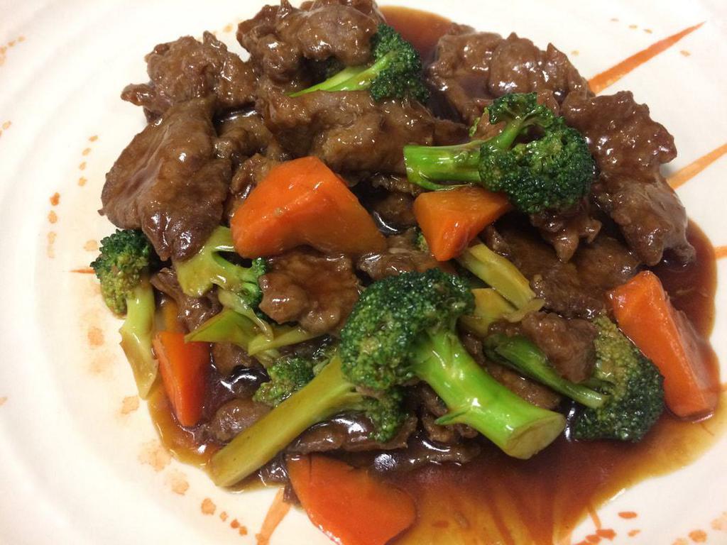 Beef with Broccoli · Tender sliced beef with fresh steamed broccoli stir-fried in house brown sauce.
