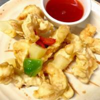 Sweet Sour Shrimp · Breaded crispy-fried shrimp prepared with pineapples, onions and bell peppers, served with s...