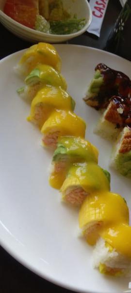 Lobster Mango Roll · Spicy crunch lobster roll topped with sliced fresh mango and avocado.
