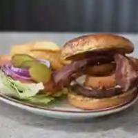 Western Burger · Served on a sesame seed bun with lettuce, red onion, tomato, and pickle. 1/3 lb of 100% lean...