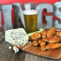 Oven Baked Wings 12pc · Our wings are baked and crisped up in our oven and finished with your choice of sauce: Naked...