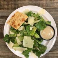 CAESAR SIDE SALAD · romaine lettuce, crostinis, parmesan cheese and homemade caesar dressing