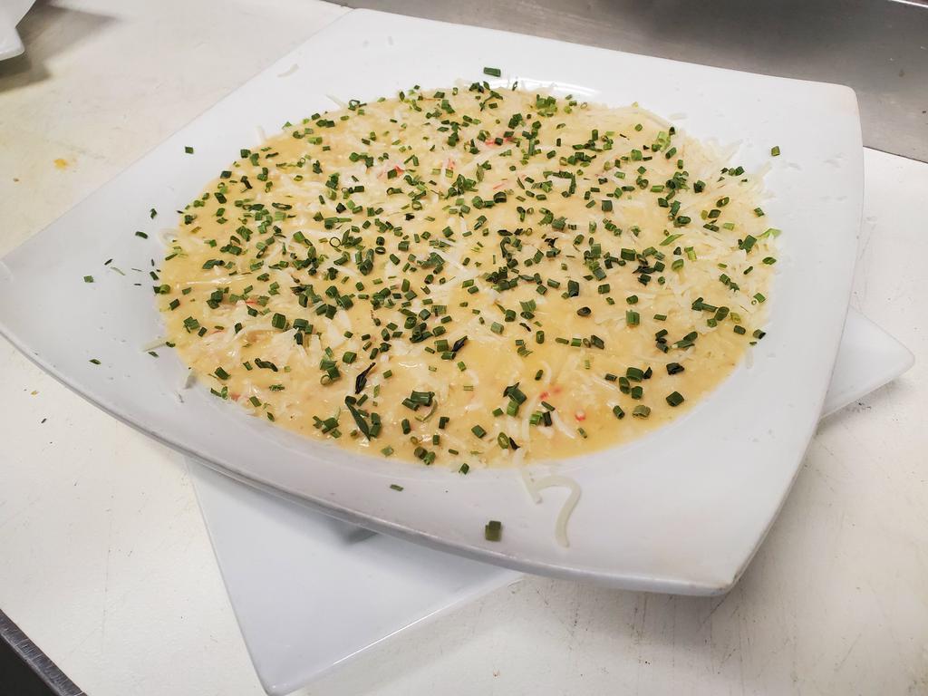 Crabmeat Bisque - Bowl · Real Crabmeat in a thick and creamy garlic seasoned Creole sauce with a sprinkle of Parmesan Cheese topped with fresh Green Onions
