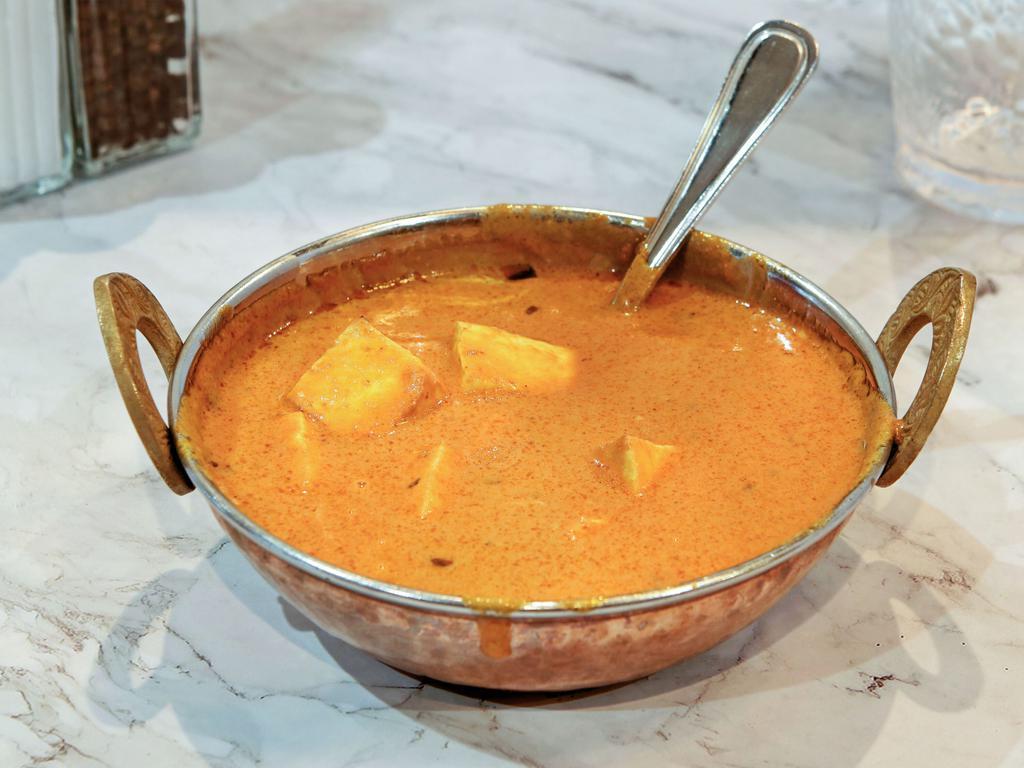 Paneer Butter Masala · Homemade Indian cheese cubes cooked in creamy tomato sauce, buttered and lightly spiced and sweetened.