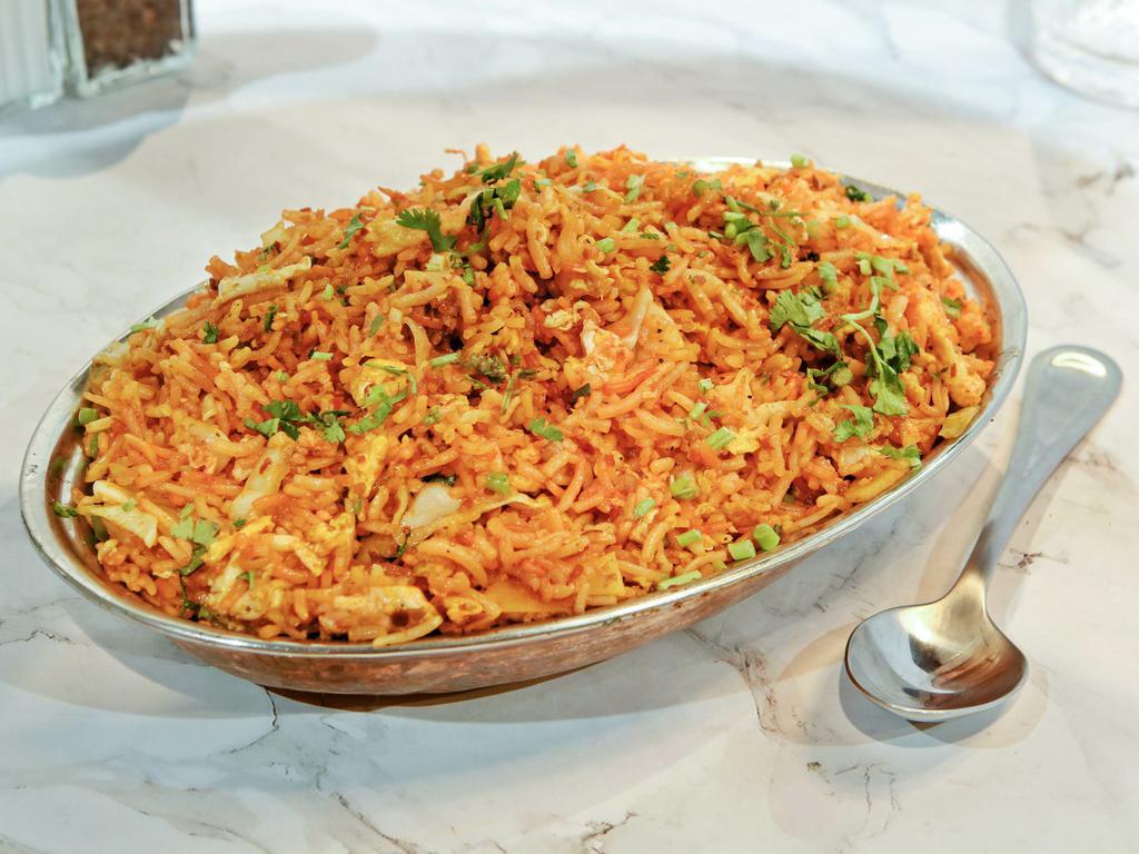 Szechuan Egg Fried Rice · New. Long grain basmati rice tossed with egg and assorted vegetables.