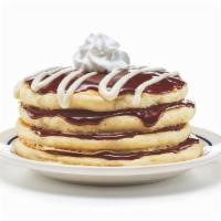 Cinn-A-Stack® Pancakes · Four buttermilk pancakes layered with cinnamon roll filling & topped with cream cheese icing. 