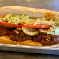 Hot Sausage Patty (Beef & Pork) · Served dressed with shredded iceberg lettuce, tomato, and dill pickles. 