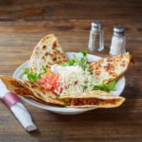 Quesadilla Tomatillo · Stuffed with our delicious slow-roasted pork, simmered in our homemade tomatillo sauce with ...
