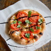 Caprese Pizza · Olive oil base, garlic, red onion, five cheeses, sliced tomatoes, balsamic glaze,  basil, ol...