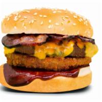 1/3 Lb. Cowboy Beef Big Burgerim · Barbecue, onion ring, bacon and cheddar cheese.