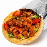 Signature Spicy Chicken Sandwich · Our fan-favorite pita bread stuffed with tender, sous-vide cooked chicken marinated in a ble...
