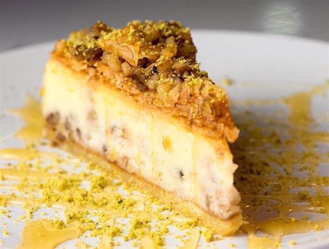 Baklava Cheesecake · The delicious taste of your favorite baklava in the creamy, decadent form of cheesecake! Allergen: MILK, EGG, TREE NUTS (WALNUTS, ALMOND), SOY, WHEAT *This product is made in a facility that processes tree nuts and utilizes peanut butter.