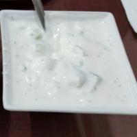 Yogurt and Cucumber · Yogurt mixed with cucumber and herb.