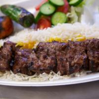 1. Soltani Kabob · Thin sliced prime sirloin steak and your choice of ground beef or chicken, skewered and char...