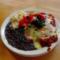 Vegetable Cheese Enchilada Plate · Our homemade enchilada filling rolled in 2 corn tortillas, baked with enchilada and cheddar;...