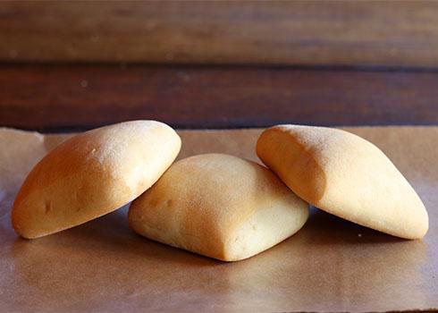 Dinner Rolls · Our famous buttery rolls, straight from Miss Ollie’s family recipes. Choose from 1, 6, or a dozen.