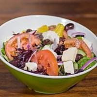 22. Greek Salad · Fresh romaine lettuce, tomatoes, cucumber, red onions, Kalamata olives and feta
cheese dress...