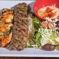 19. Chicken Kabob · 2 skewers of marinated chicken breast, chardbroiled and cooked on a fire flamed grill and se...