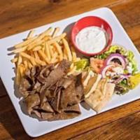 12. Gyros Platter · Beef and lamb gyros, choice of side and served with tzatziki sauce.
