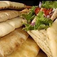 Kids Half Pita Pocket · Choice of filling served in half a small pita with lettuce, tomatoes, and onions.