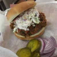 Pulled Pork Sandwich   · Comes with coleslaw. Pickles and Onions upon request.