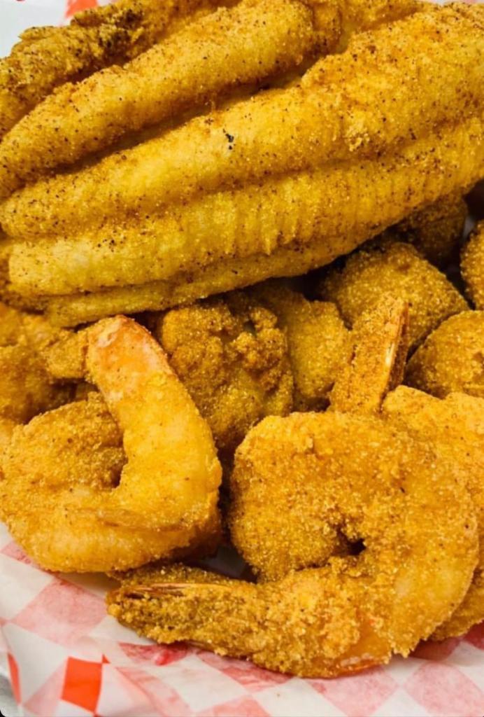 Catfish and Shrimp Plate · 7 to 9 once filet and 6 large shrimp Served with seasoned fries, Cole slaw,hush puppies tartar sauce and lemon wedges.