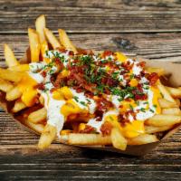 Supreme Fries · French Fries topped with cheese, bacon, chives, and b's ranch