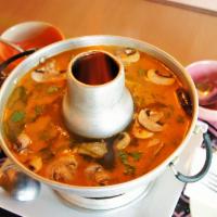 SO5. Seafood Soup · Crab, shrimps, squids, clams, mussels and fish in a hot spicy lemon soup.