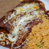Mole Enchiladas · 3 chicken enchiladas with mole sauce and cheese.