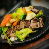 Fajita Vegetal Specialty · Beef or chicken fajitas with grilled broccoli, carrot, cauliflower, zucchini, onions, tomato...