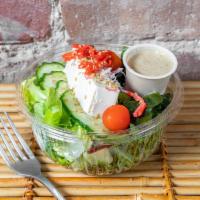 Tofu Salad · Japanese made white soft tuck, mix greens topped with Wakame seaweed, slice of cucumber Kirb...
