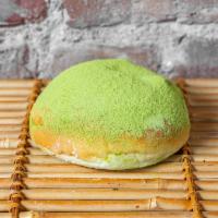Mochi Anpan Sweet Dough · Sweet red bean and mochi ( sticky rice cake )matcha powder on the topping.