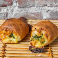 Spicy Jalapeno Cheddar Cheese  French Dough · Small amount of chopped Jalapeno with cheddar cheese in French dough.