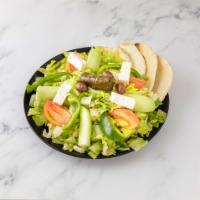 Greek Salad · Lettuce, tomato, cucumbers and peppers with feta and olives. 
