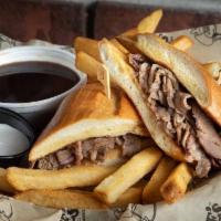 #72 Prime Rib Dip · Premium Beef, tender thin-sliced, toasted French Roll, Au Jus.