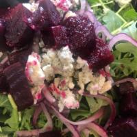 Roasted Beet Salad · baby arugula, red onion, gorgonzola crumbles, red wine vinaigrette served on the side