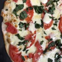 Margherita Pie · mozzarella, garlic, fresh sliced tomatoes, fresh mozzarella, basil, extra virgin olive oil