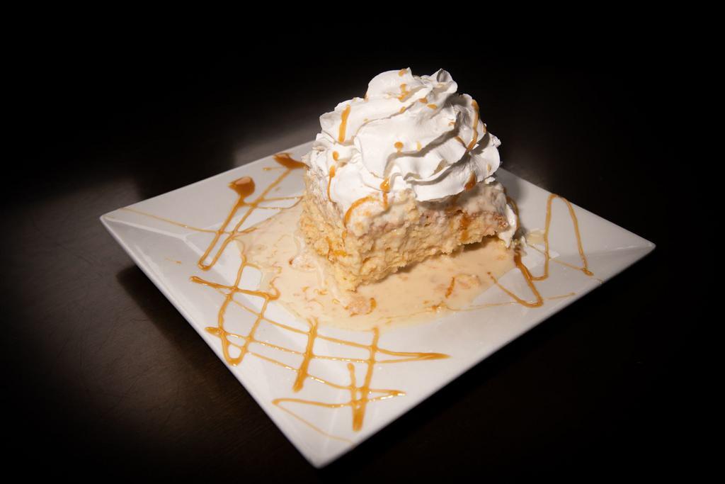 Tres Leches Cake · A butter cake soaked in three kinds of milk.