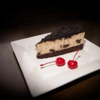 Oreo Mousse Cake  · An Oreo crust with divine mousse filling and Oreo crumble on top.